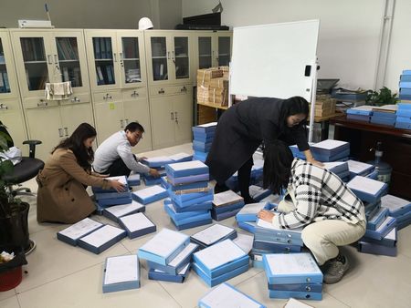 陜煤建設(shè)天工公司資料整理下辛勞 文件歸檔鑄佳績(jī)