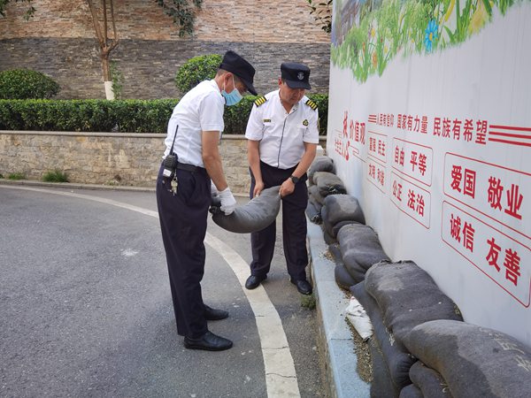 陜煤建設大秦置業(yè)公司：多措并舉做好小區(qū)防汛備汛工作