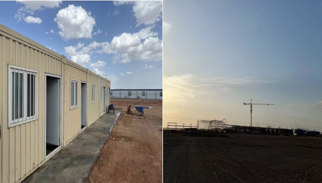 萬頃黃沙映壯志，樓閣巍巍矗風(fēng)沙